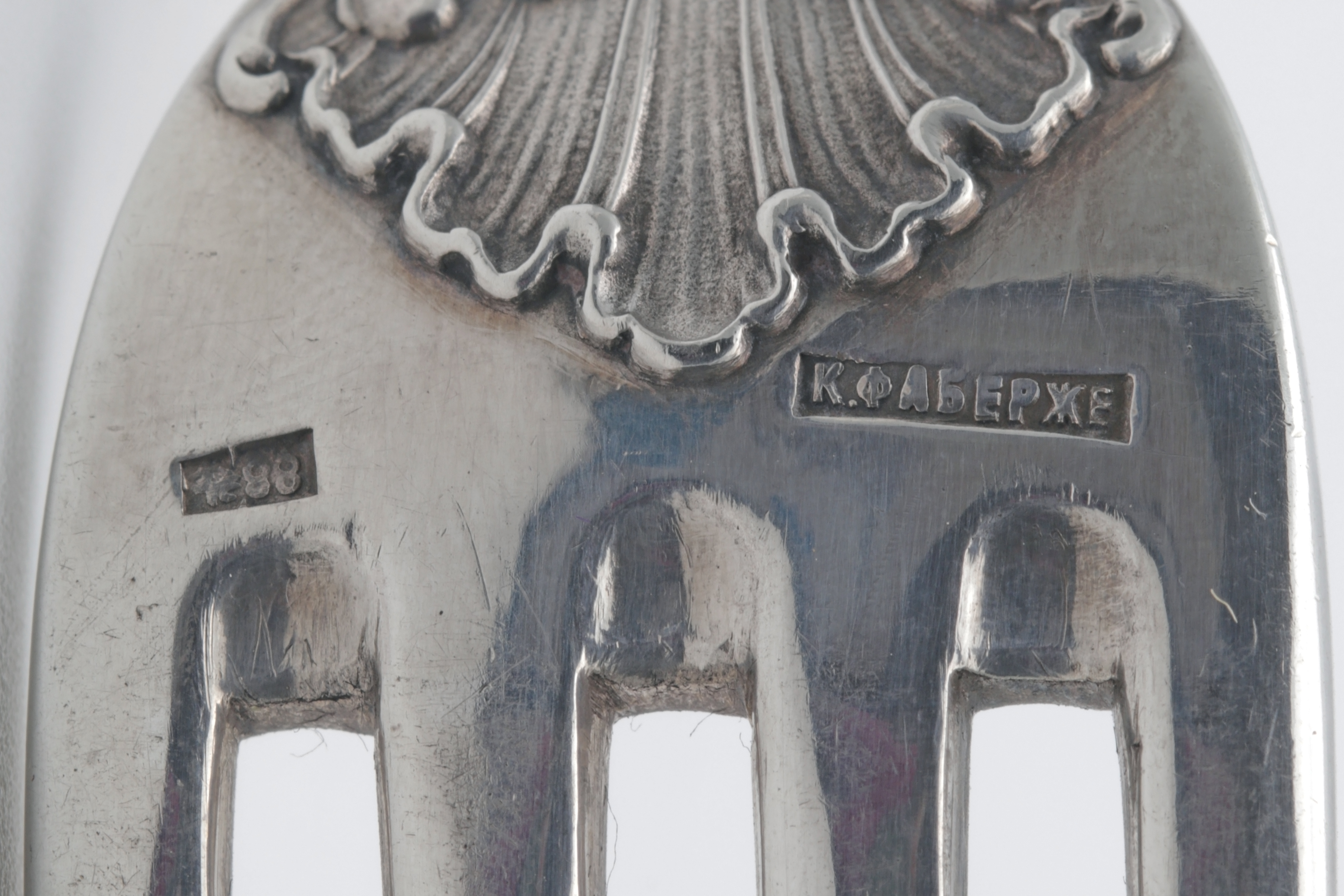 A Russian silver mark showing the maker's stamp "К.ФАБЕРЖЕ" (K. Fabergé) in Cyrillic next to a date stamp — exactly the configuration found on workshop pieces from the Fabergé firm.