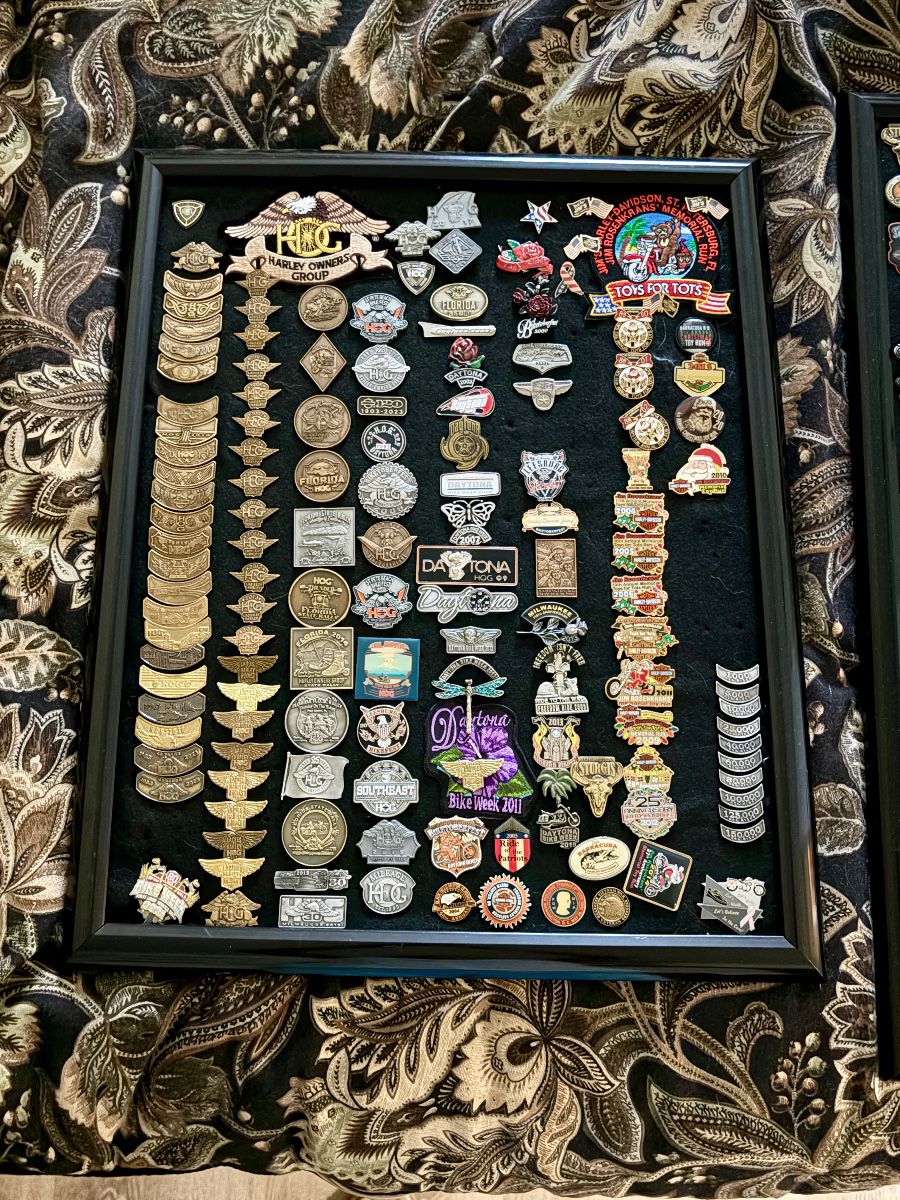 Framed Harley-Davidson HOG pin collection at the Seminole estate sale near St. Petersburg